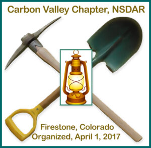 Official Carbon Valley Chapter Logo. A crossed pickaxe and shovel with a kerosene lantern sitting where the two tools cross.