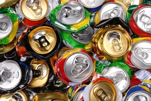 A collection of very colorful aluminum cans ready for recycling